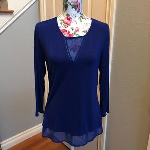 Blue blouse with sheer cut outs
